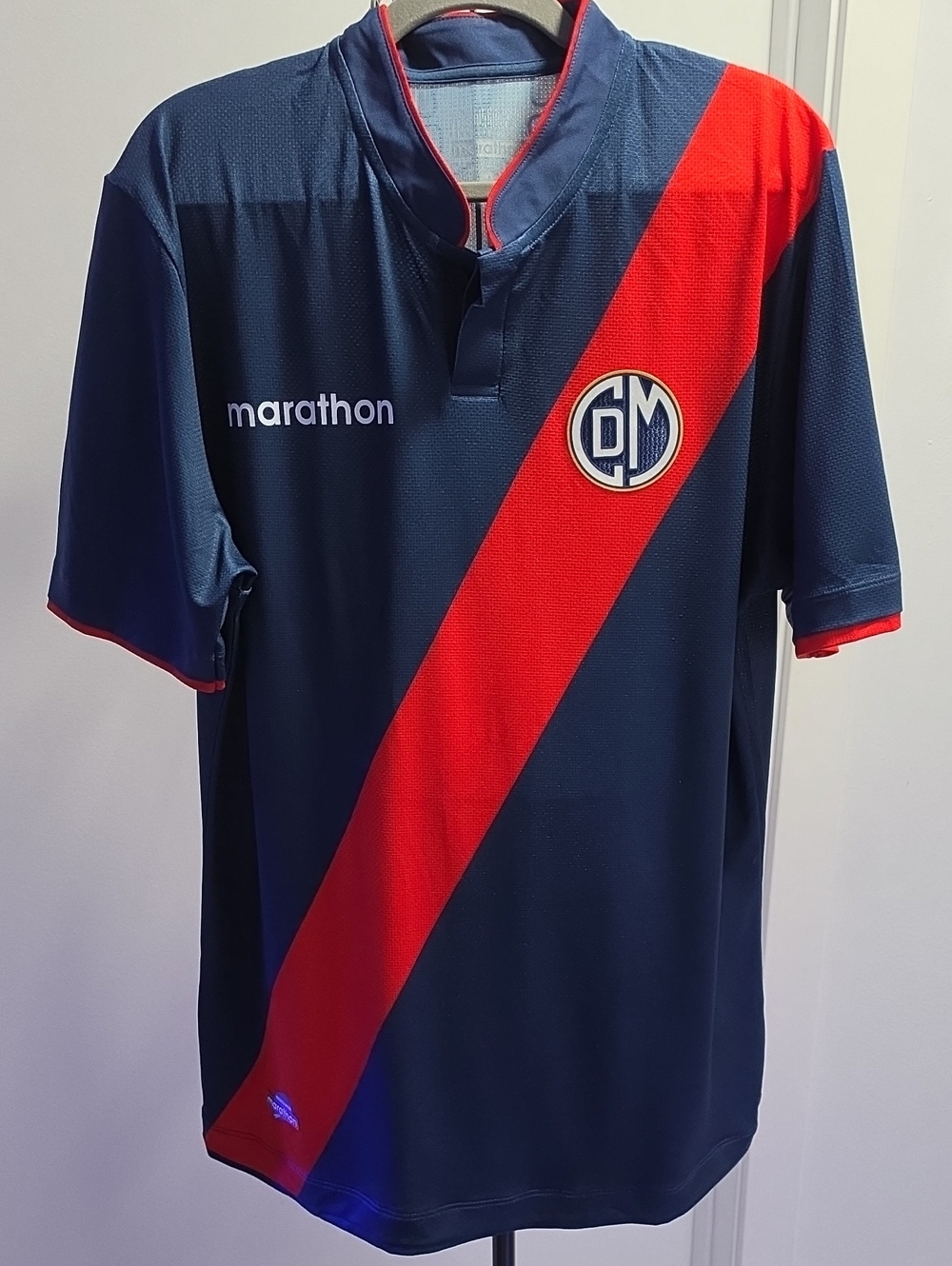 The Marathon Clothing Navy Blue and Red Diagonal Stripe Soccer Jersey
